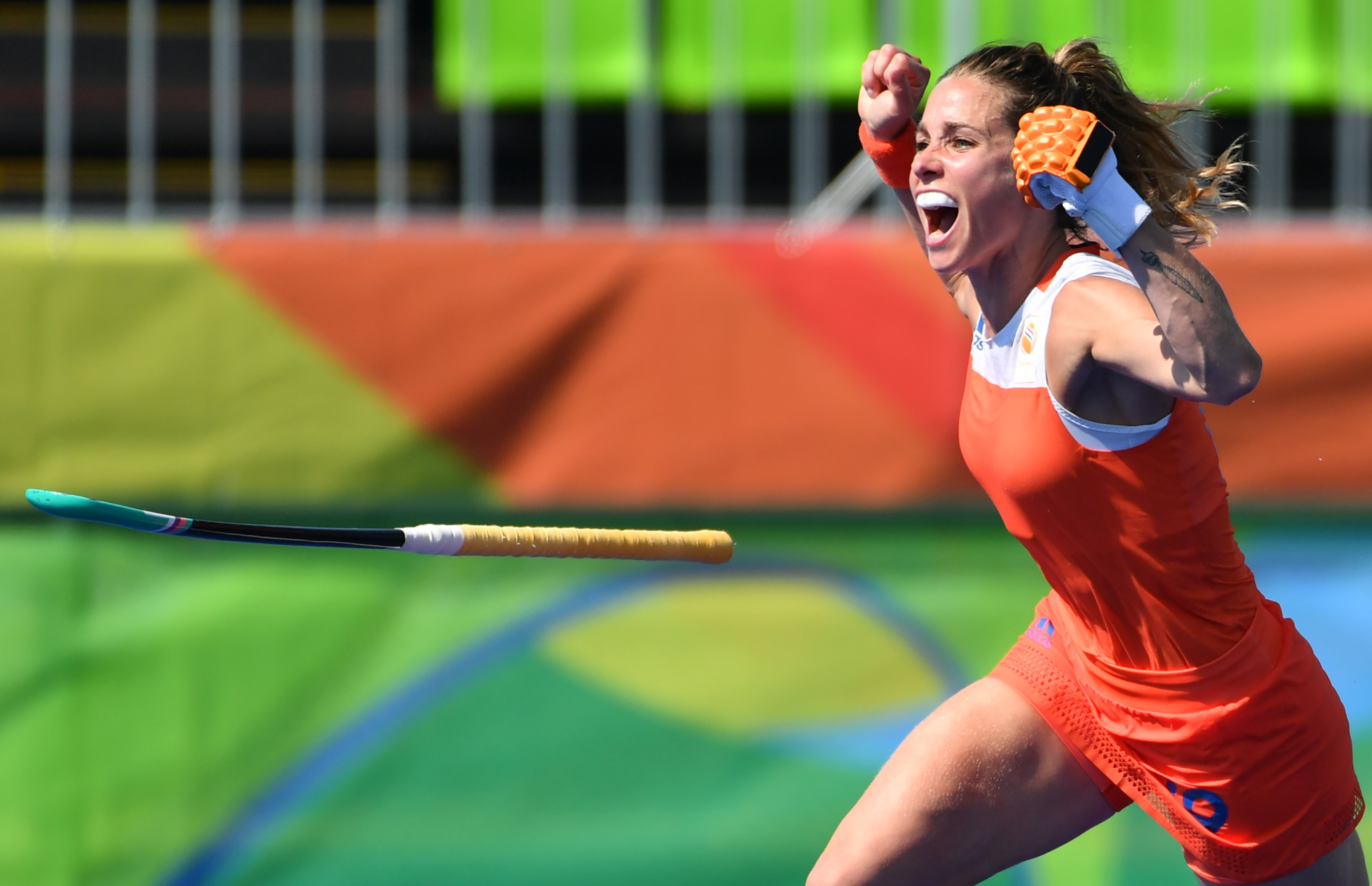 TOPSHOT - Netherlands' Ellen Hoog celebrates her goal during the penalty shoot-out at the end of the the women's semifinal field hockey Netherlands vs Germany match of the Rio 2016 Olympics Games at the Olympic Hockey Centre in Rio de Janeiro on August 17, 2016. / AFP / Pascal GUYOT (Photo credit should read PASCAL GUYOT/AFP/Getty Images)